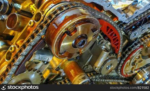 shown large car engine with exposed timing chains