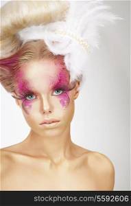 Showy Woman with Fuzzy Feathers and Fantastic Art Makeup