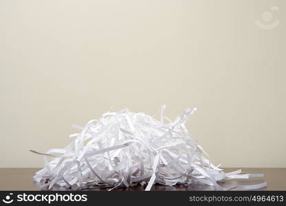 Shredded paper on desk