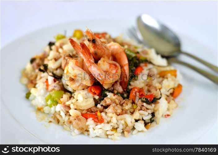Shrimp and minced pork fried with chili pepper and sweet basil on rice