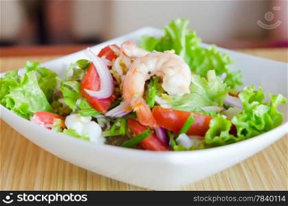 shrimp and mix vegetable spicy salad , asian cuisine
