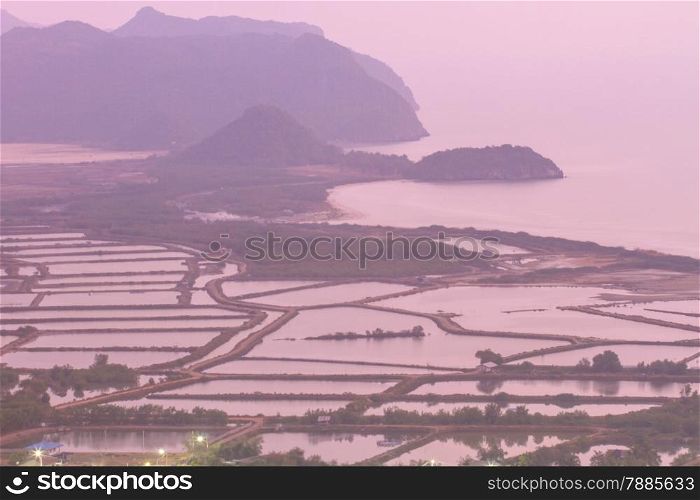 Shrimp farms and limestone mountains in country