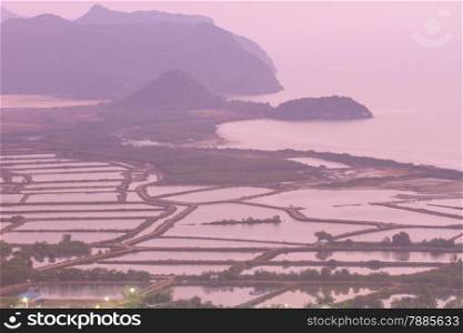 Shrimp farms and limestone mountains in country
