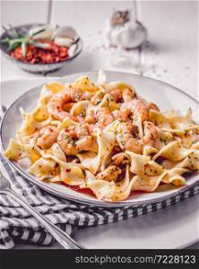 Shrimp in pasta chili tapas with herbs
