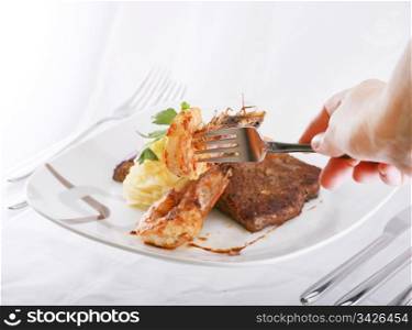 shrimp on fork over a mix food background