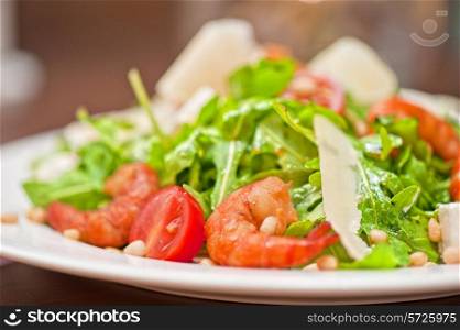shrimp salad with cheese and arugula