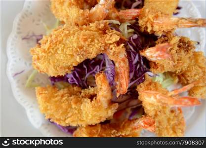 Shrimp with salad in a restaurant at the Hat Railay Leh Beach at Railay near Ao Nang outside of the City of Krabi on the Andaman Sea in the south of Thailand. . THAILAND