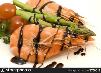 shrimps and asparagus. close up photo of shrimps with asparagus and balsamic vinegar