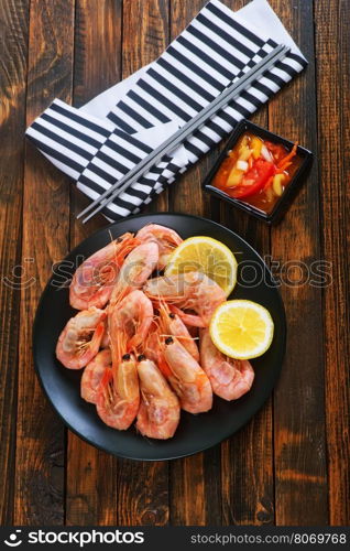 shrimps on plate and on a table