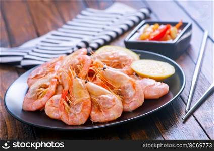 shrimps on plate and on a table