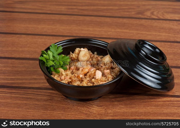 Shrimps risotto garnished with fresh parsley