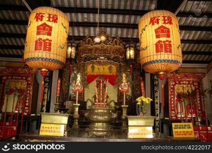 Shrine in old buddhist temple in Hoi An, central Vietnam