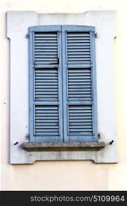 shutter europe italy lombardy in the milano old window closed brick abstract