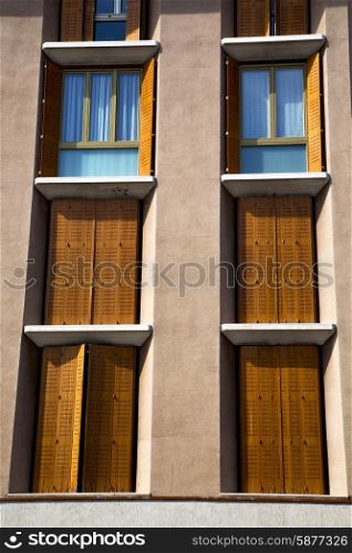 shutter europe italy lombardy in the milano old window closed brick abstract grate