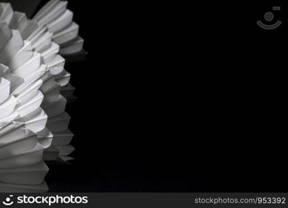 Shuttlecock in a badminton tournament on a black background.