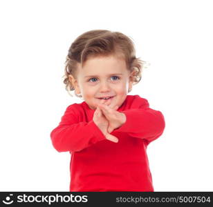 Shy baby with two years wearing red t-shirt isolated on a white background