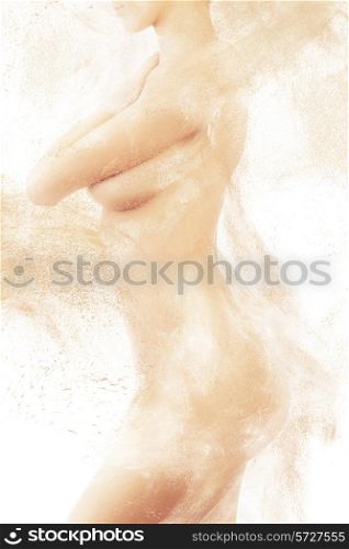 shy naked woman body in sand powder