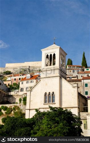 Sibenik, Dalmatia / Croatia - 21 07 2014: Old town streets in town Sibenik with marble and stone buildings in background. Tourist place to visit.. Old town streets in town Sibenik with marble and stone buildings in background. Tourist place to visit.