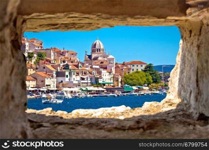 Sibenik waterfront through stone window view, Dalmatia, Croatia