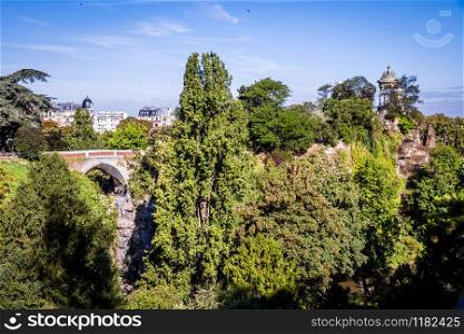 Sibyl temple and pond in Buttes-Chaumont Park, Paris, France. Sibyl temple and pond in Buttes-Chaumont Park, Paris