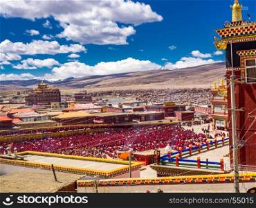 Sichuan, China - April 10, 2017 : Unidentified tibetan buddhist monks and nuns gathered in Yarchen Gar Monastery in Sichuan, China, on April 10, 2017