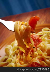 Sicilian homemade pasta Fettuccine with marinara sauce .farm-style