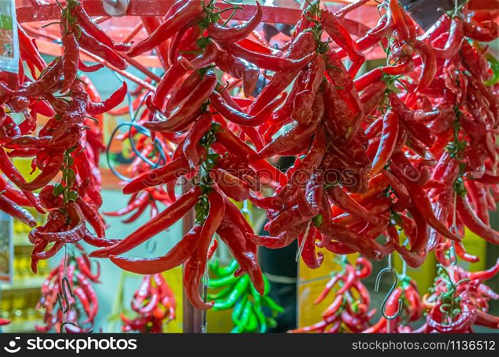 Sicilian red chillies on exibition and for sale in a typical stall