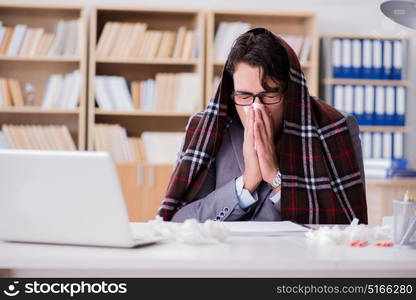 Sick businessman suffering from illness in the office