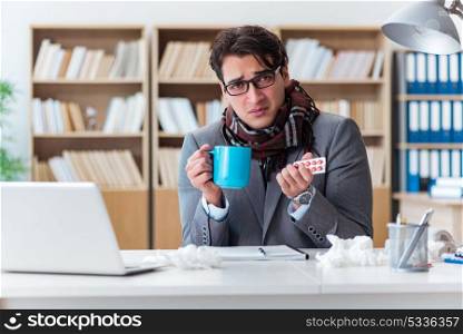 Sick businessman suffering from illness in the office