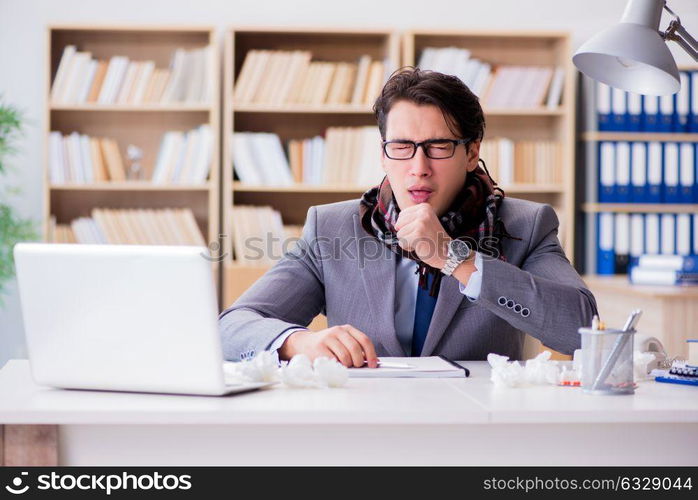 Sick businessman suffering from illness in the office