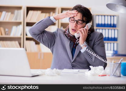 Sick businessman suffering from illness in the office