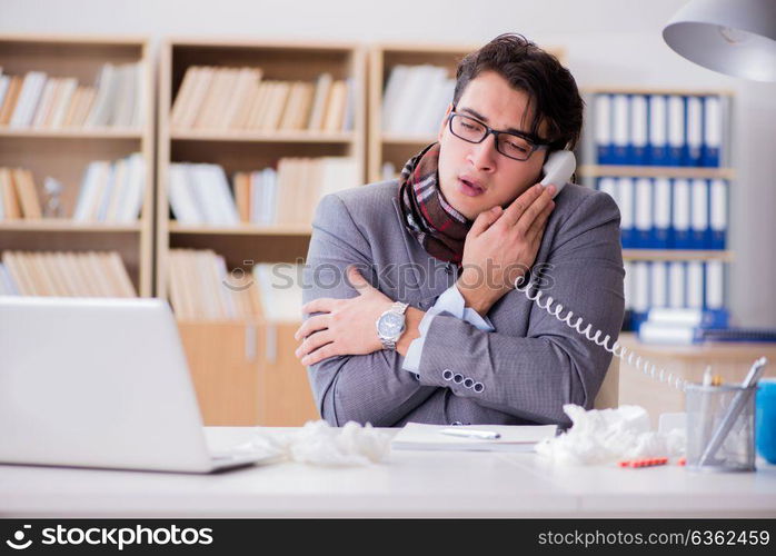 Sick businessman suffering from illness in the office