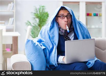 Sick businessman working from home due to flu sickness