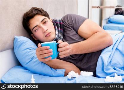 Sick ill man in the bed taking medicines and drugs