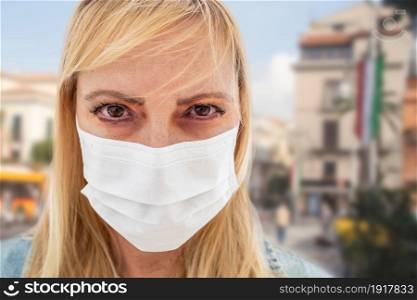 Sick Infected Young Woman Wearing Face Mask Walks on Street In Italy.