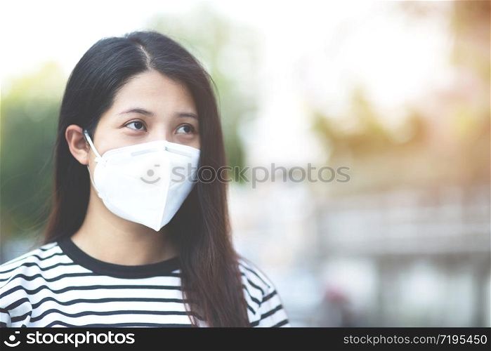 Sick infectious woman asian with wearing protection medical face mask against coronavirus portrait. close up pandemic virus disease. Health care Covid 19 outbreak contamination concept
