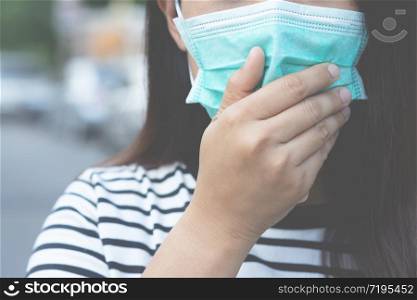 Sick infectious woman asian with wearing protection medical face mask against coronavirus portrait. close up pandemic virus disease. Health care Covid 19 outbreak contamination concept.