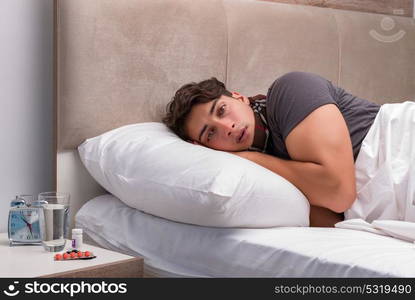 Sick man resting in the bed