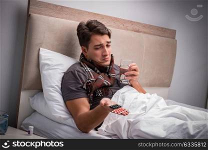 Sick man resting in the bed