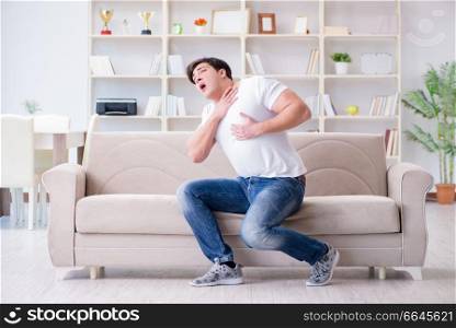 Sick man suffering at home from infection and bad stomach