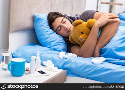 Sick man with flu lying in the bed