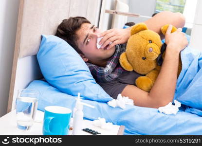 Sick man with flu lying in the bed