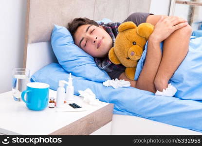 Sick man with flu lying in the bed