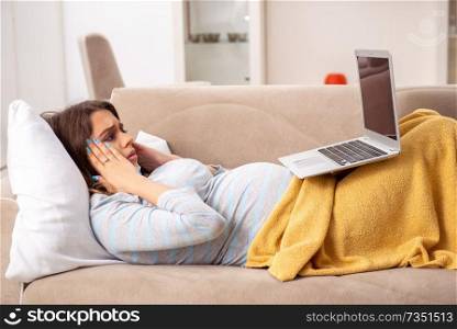 Sick pregnant woman suffering at home