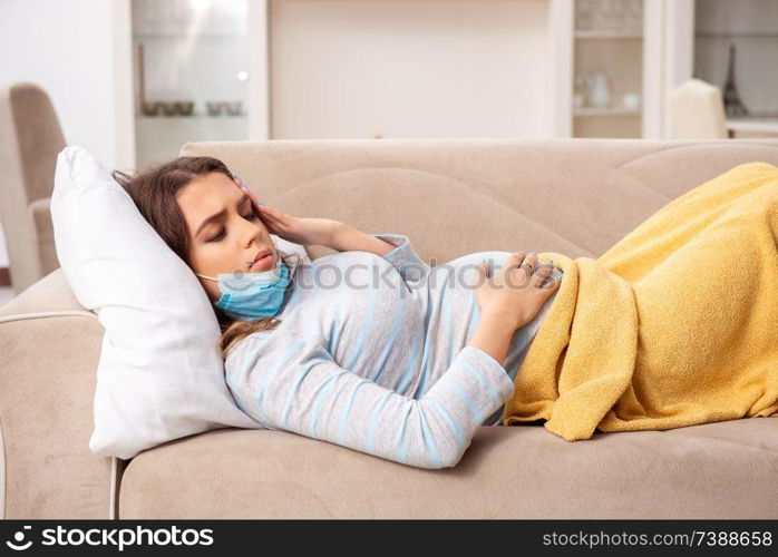 Sick pregnant woman suffering at home 