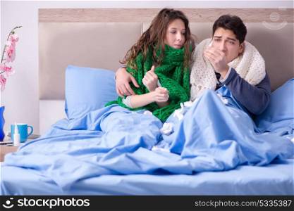 Sick wife and husband in bed in home