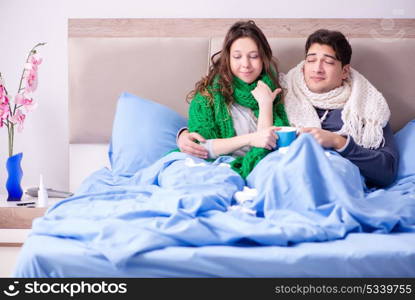 Sick wife and husband in bed in home