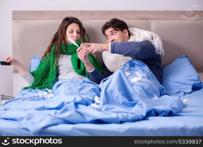 Sick wife and husband in bed in home