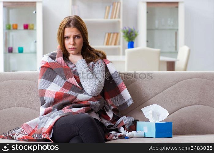 Sick woman suffering from flu at home