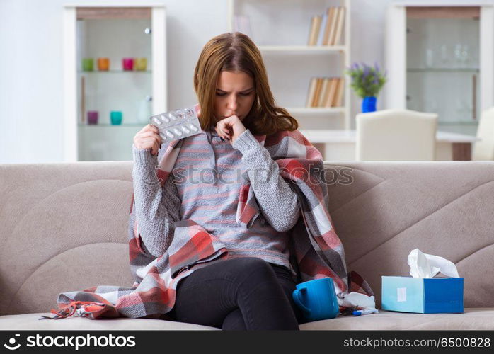 Sick woman suffering from flu at home